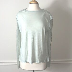 Free People Mint top with lace sleeves. Gorgeous. Size L. No tag but never worn